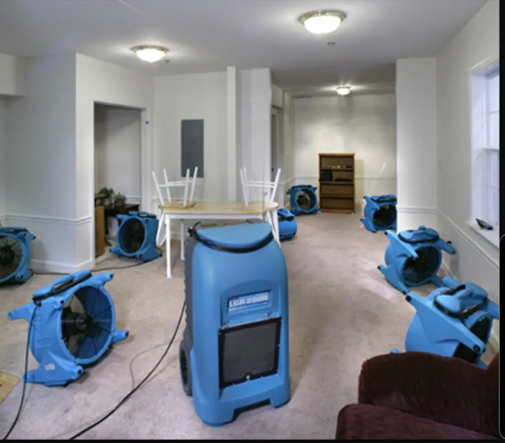 Air movers and dehumidifier setup for Water Damage Restoration in Laie
